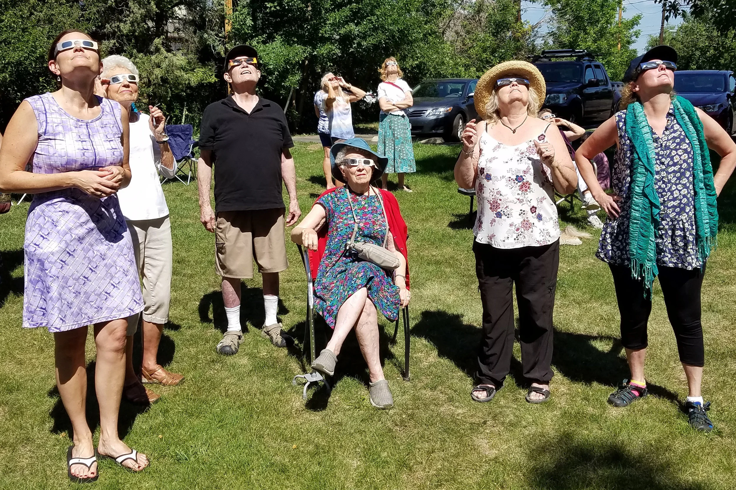 Parishioners, University of Colorado students, and neighbors gathered at St. Aidan’s Episcopal Church in Boulder for an eclipse party on their green. Photos courtesy Beth McKnight