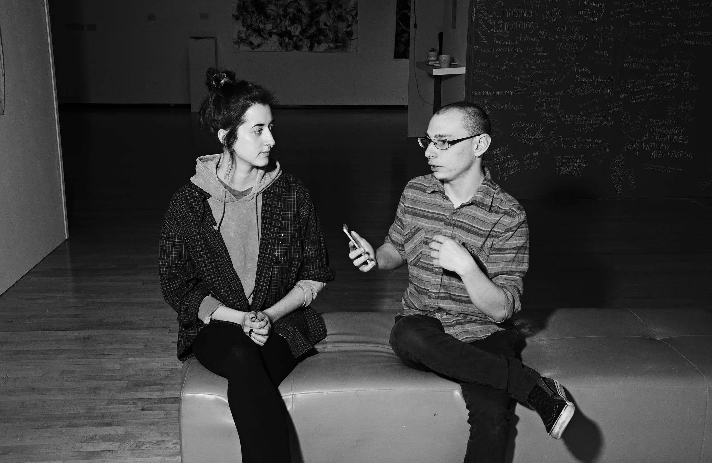 Chloe Collins (left) and Stephen Marro (right) interview at the Innocence exhibition (Photographer: Joshua Mason)