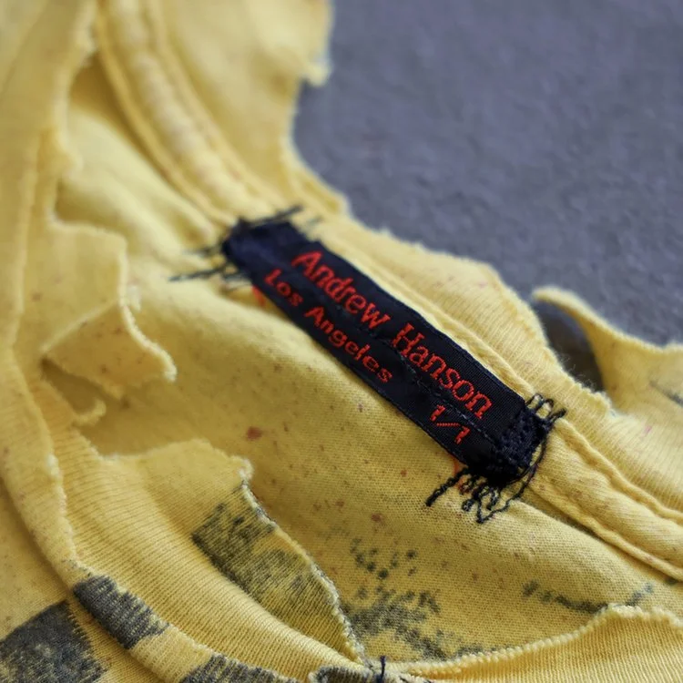 War is over t-shirt neck tag Clothing That Speaks.jpg