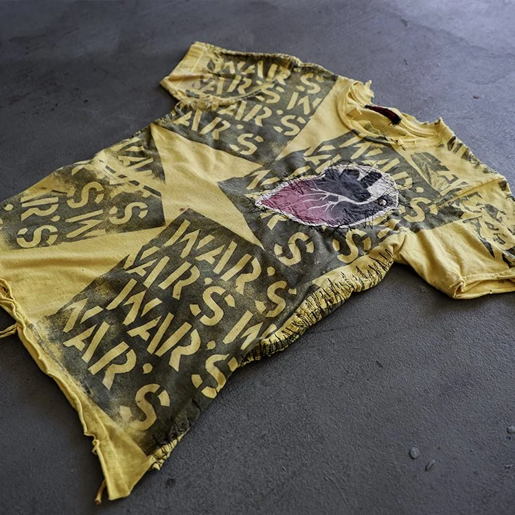 War is over t-shirt side Clothing That Speaks.jpg