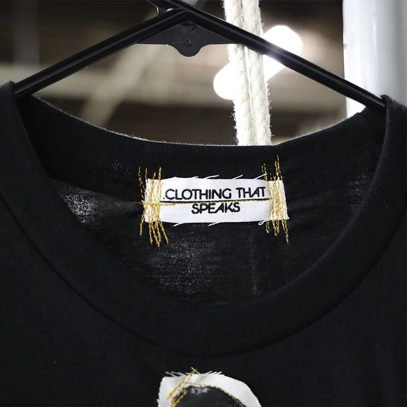Clothing that speaks Halloween tshirt tag.jpg
