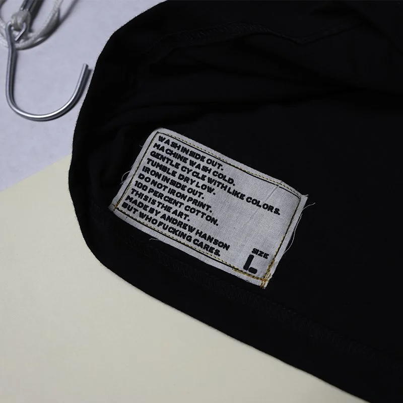 Clothing that speaks Halloween tshirt care lable.jpg