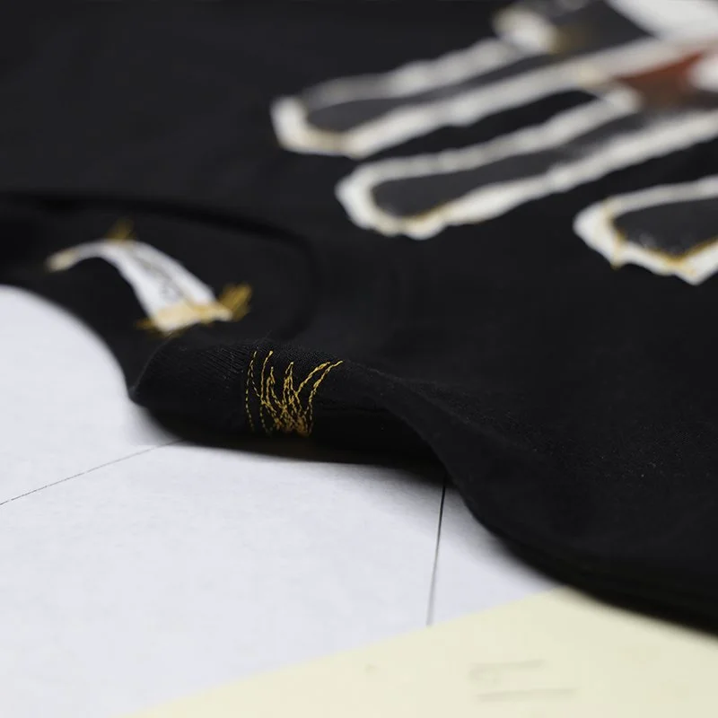 Clothing that speaks Halloween tshirt shoulder stitching.jpg