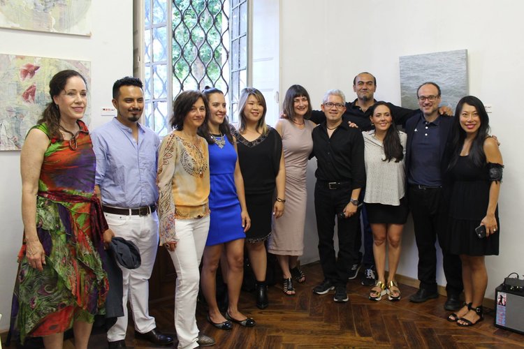 Artists with the museum director and curator for the opening night in Torino, Italy.