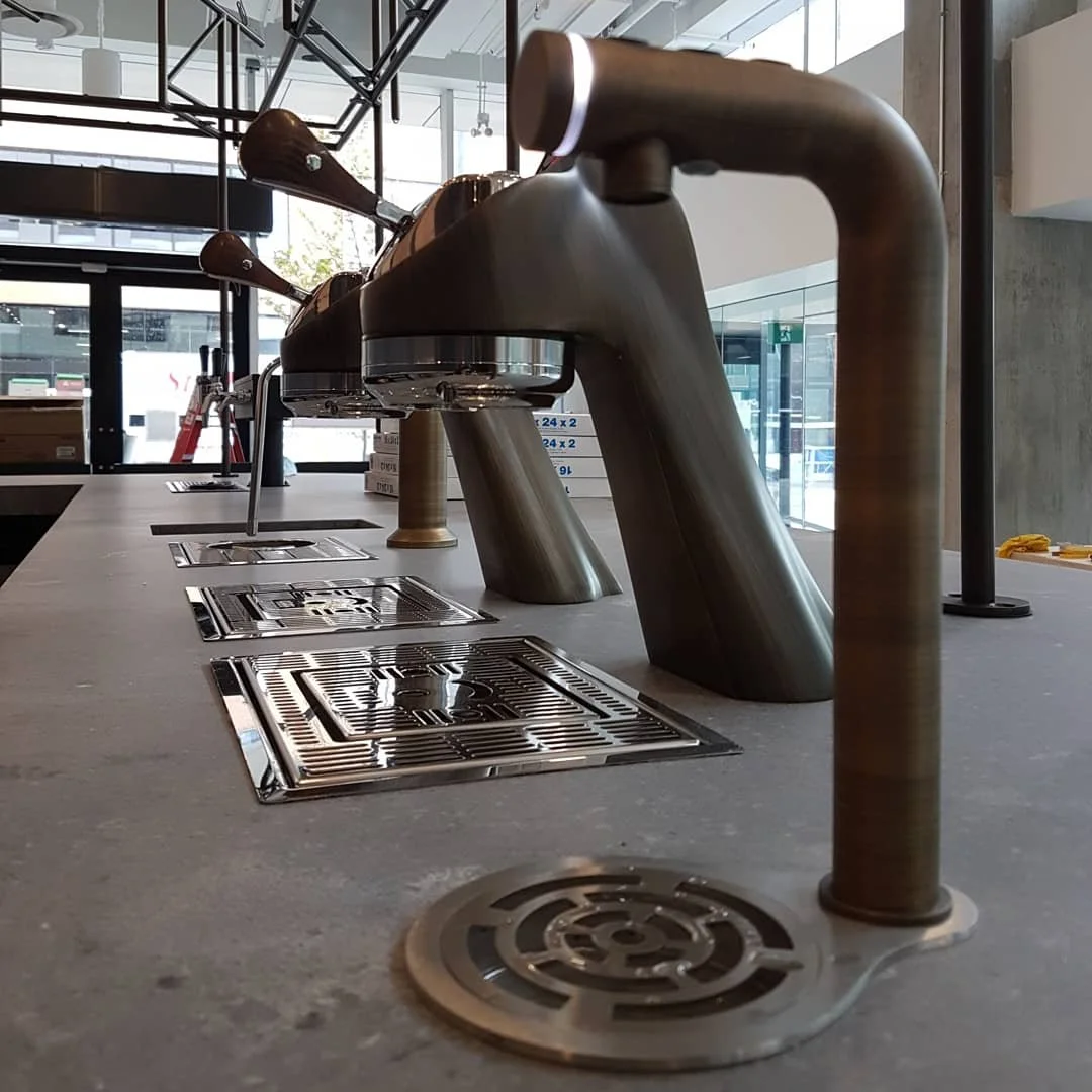 Arvo Coffee + Wine, Liberty Village, Toronto. Featuring the modbar steam and espresso, and Marco MIX fonts, in luxurious antique bronze: a LEGENDS Designbar exclusive.