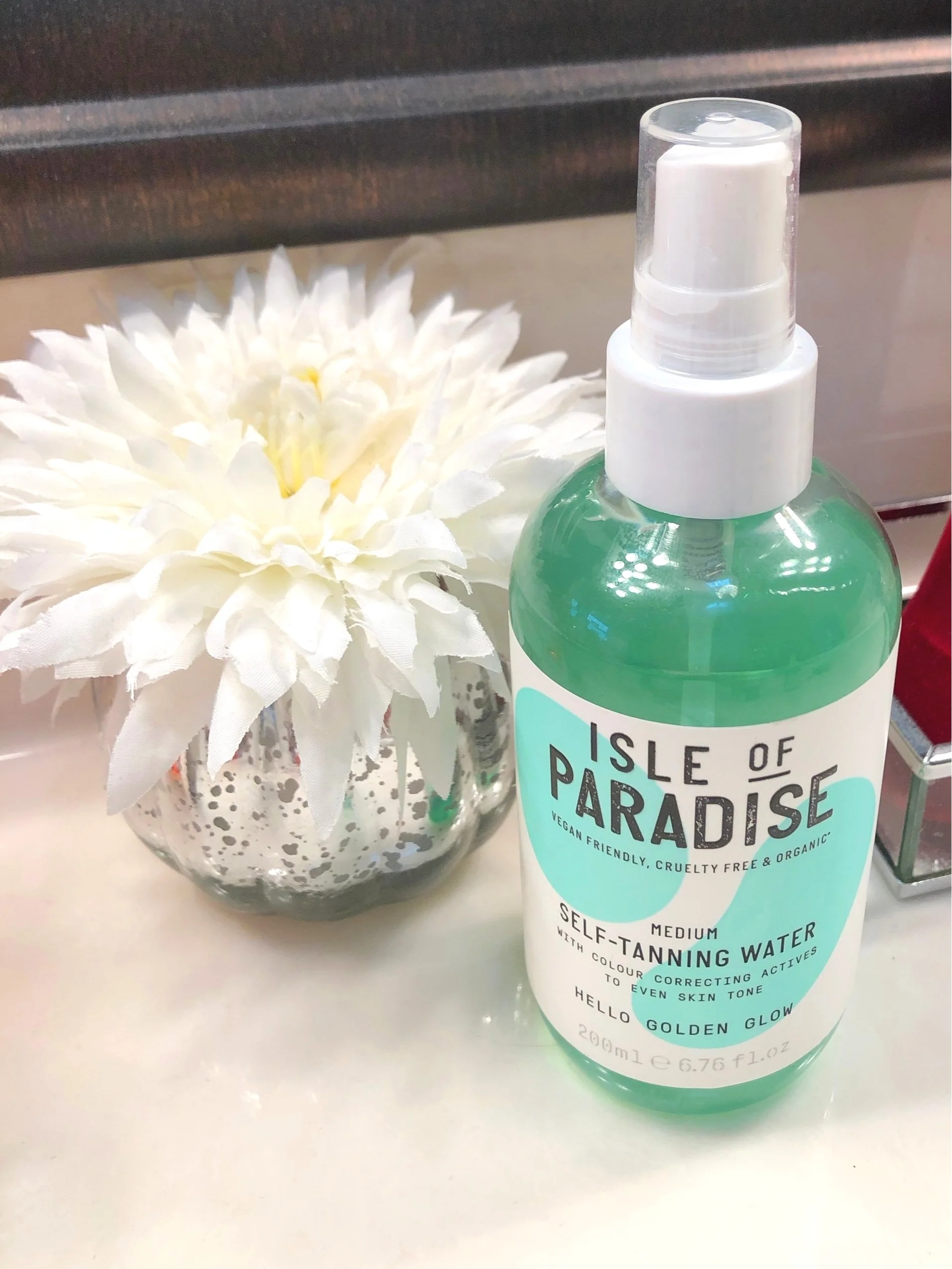 isle of paradise tanning water.jpg
