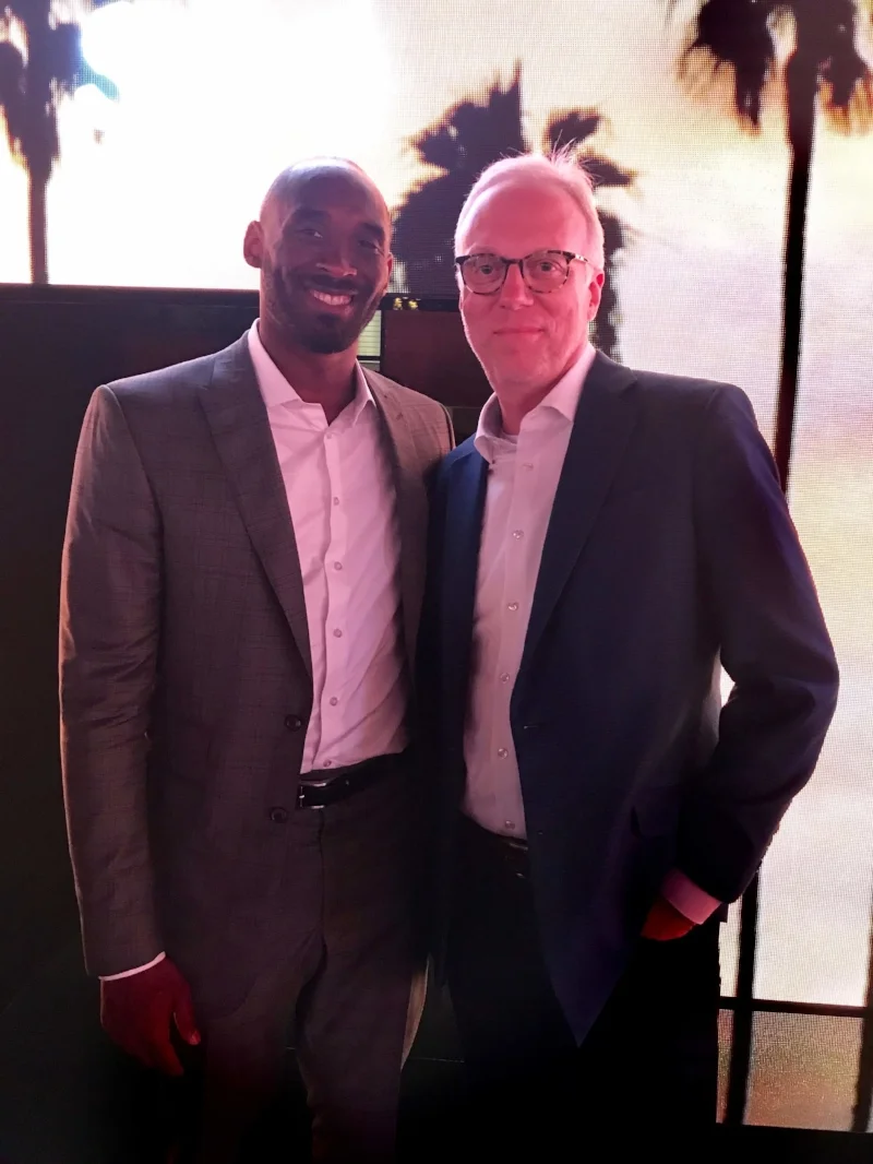 Kobe Bryant and some old dude with a huge head.