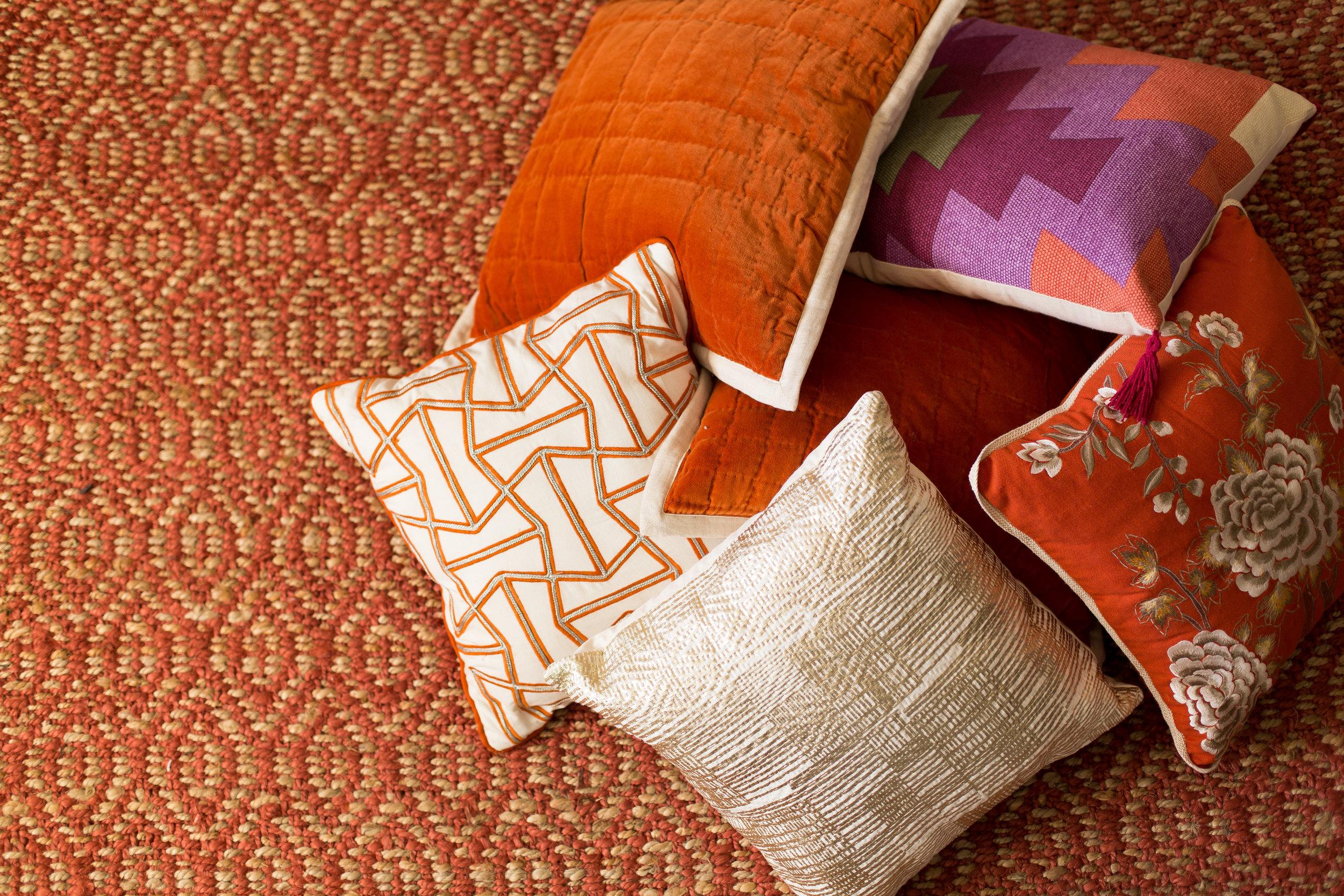 Dayka Robinson Budget Decorating pattern mix rust sisal pillows.jpg