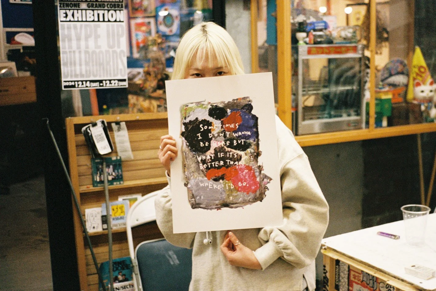 rhys viorr print with an art collector in osaka at the exhibition opening