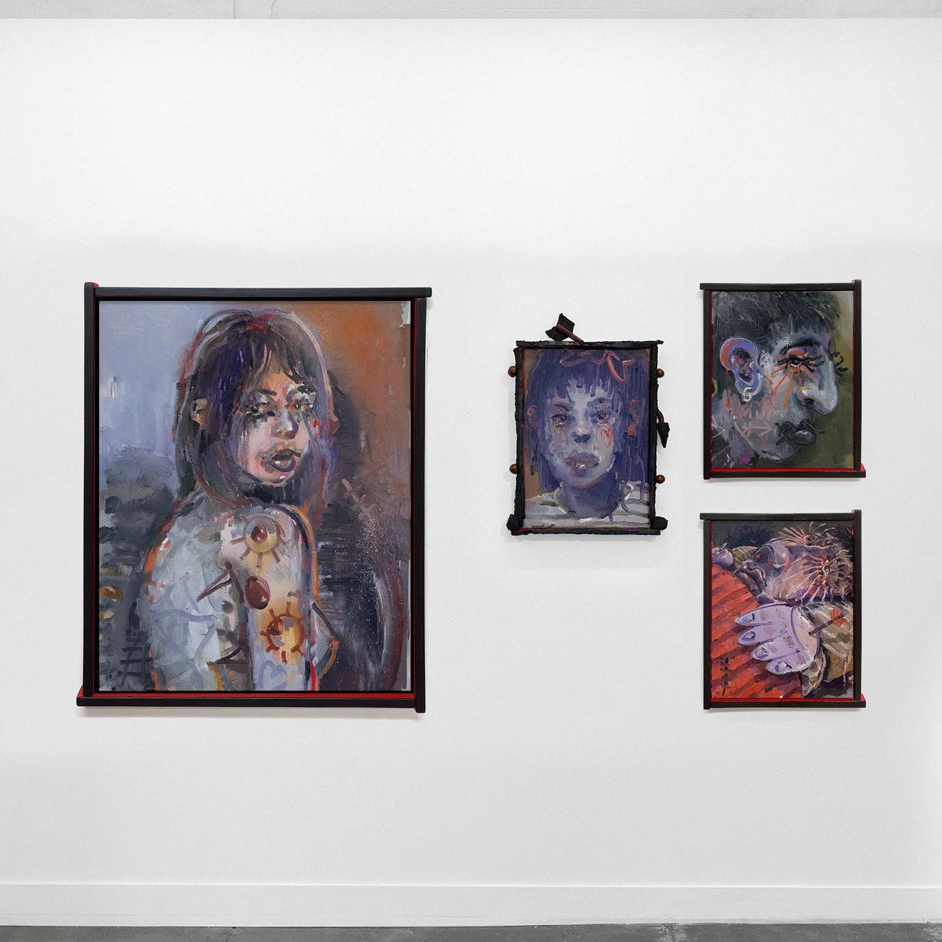 Rhys Viorr Exhibition install with hand made frames on oil paintings