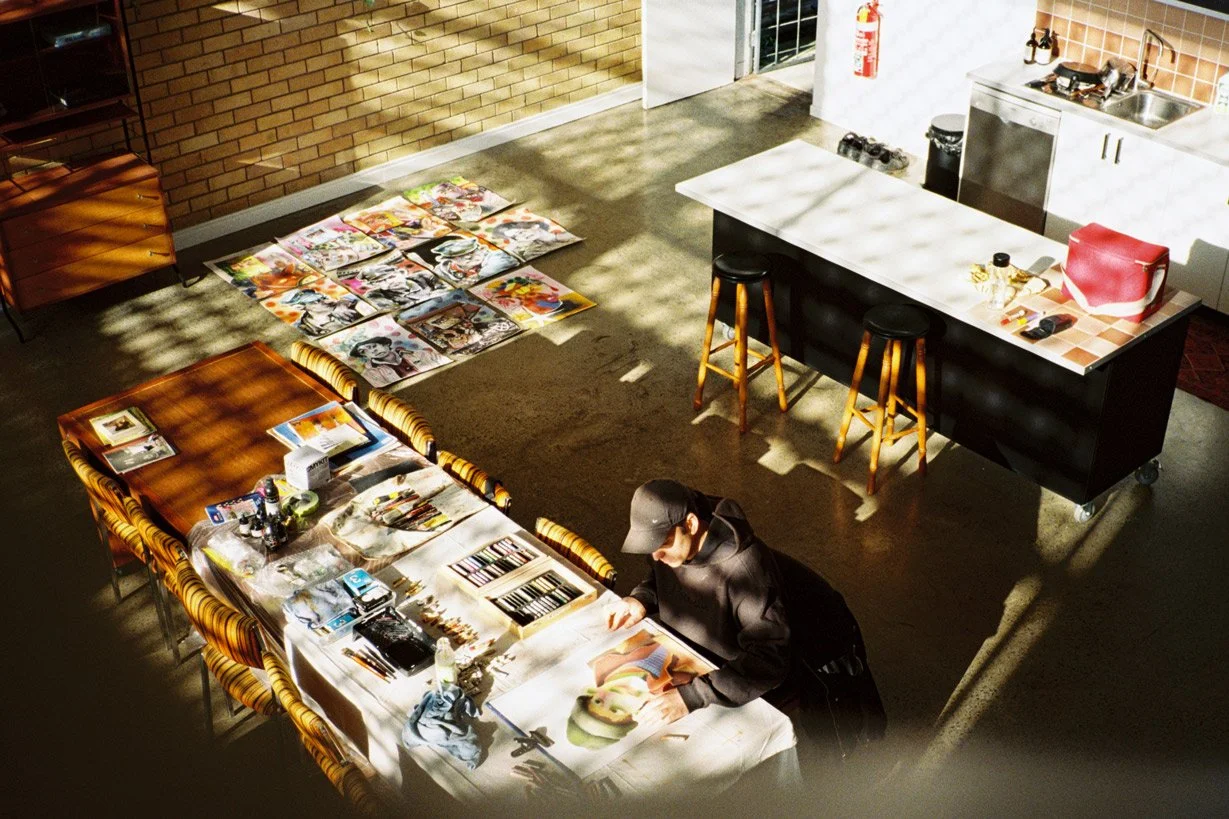 rhys viorr painting at the artist residency near sydney in port kembla
