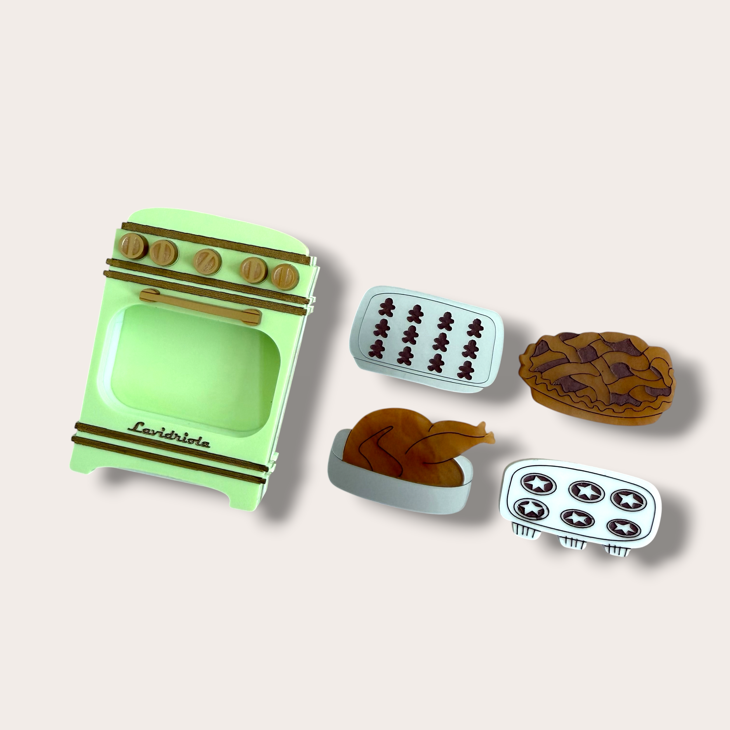 Danilova, La Vidriola, What's Cooking in the Oven, Interactive Acrylic Brooch, Pistachio1.PNG