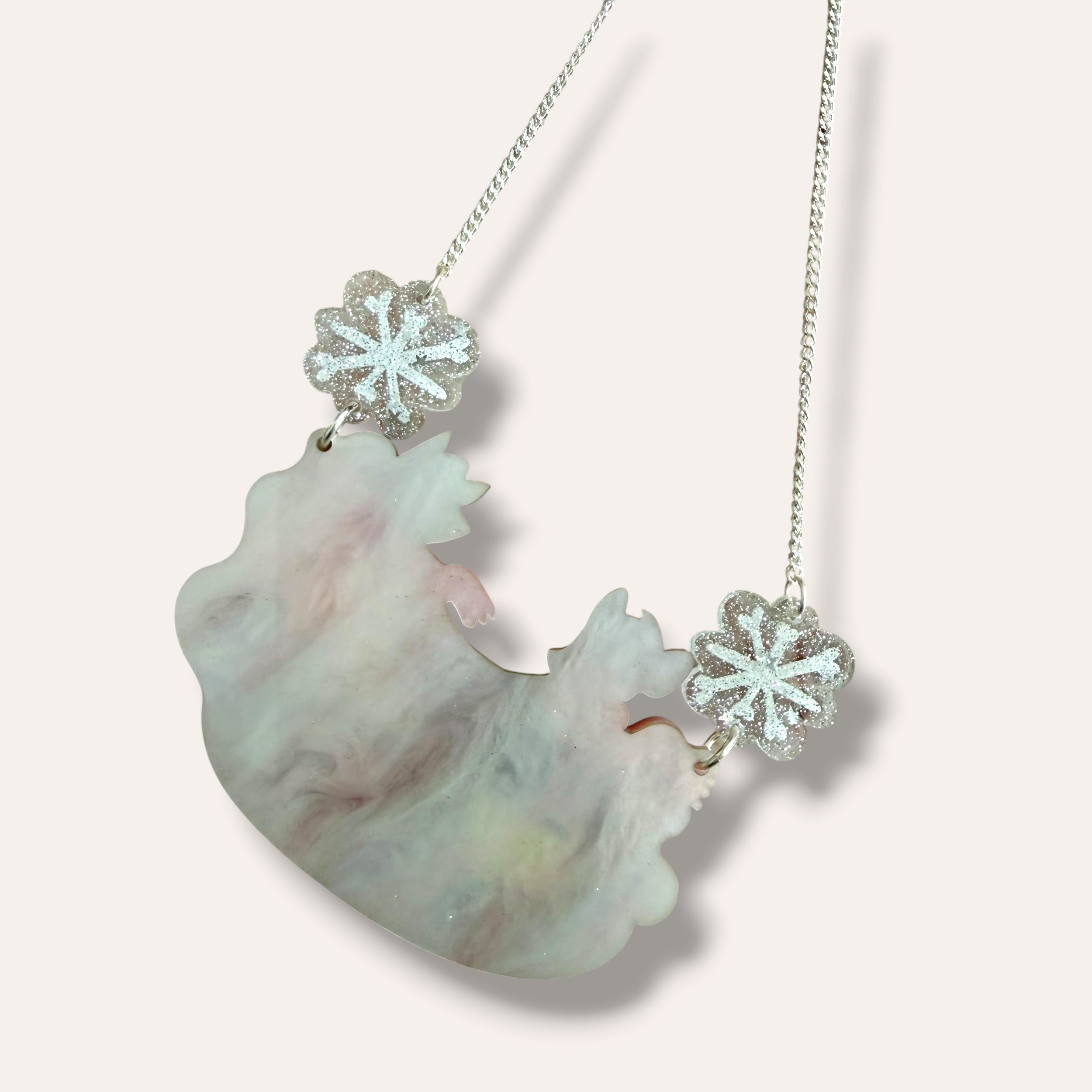 Danilova%2C+La+Vidriola%2C+Ice+Skating+in+a+Winter+Wonderland%2C+Acrylic+Necklace5.png