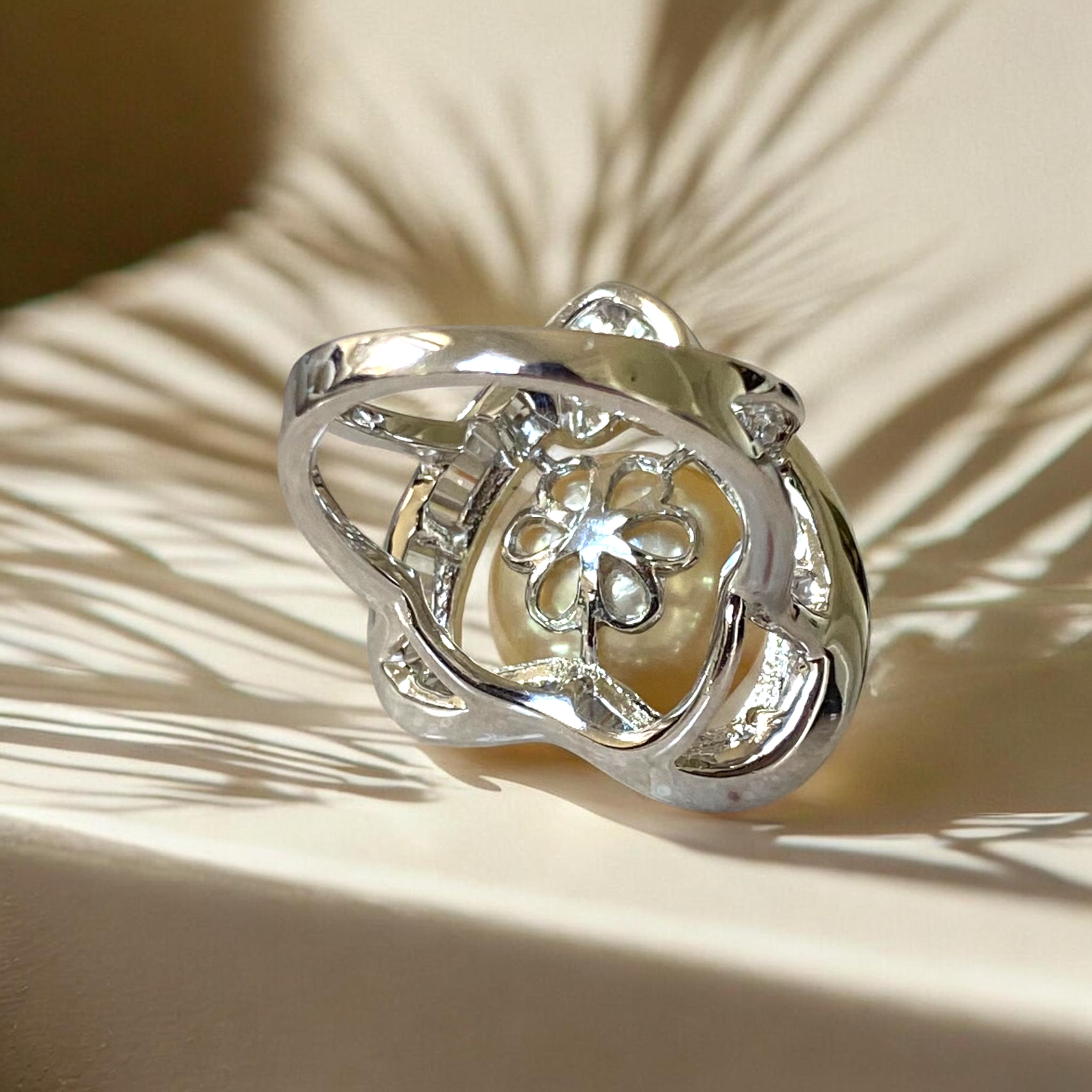 South Sea, Gold Pearl Ring in Silver Heart Halo Setting5.PNG