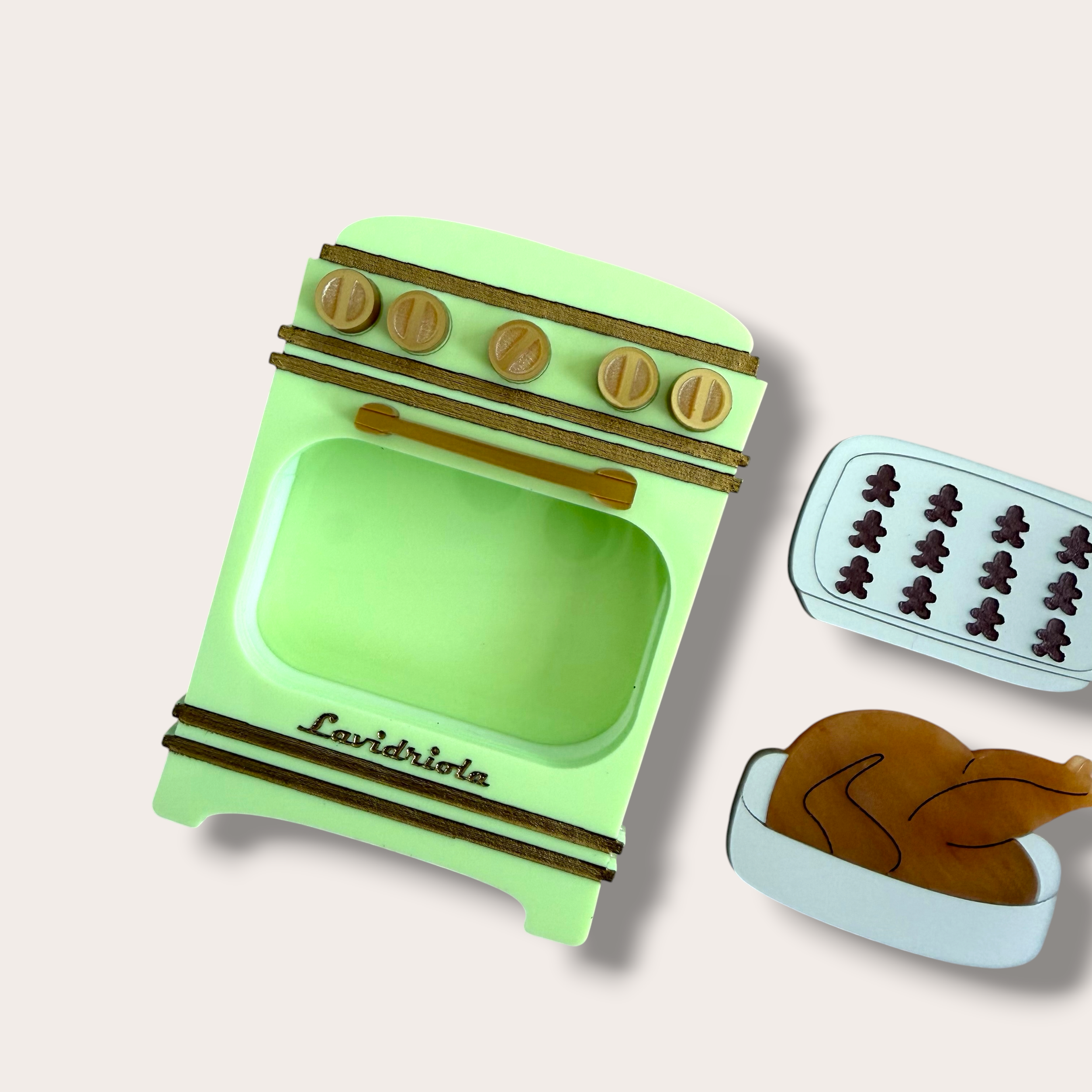 Danilova, La Vidriola, What's Cooking in the Oven, Interactive Acrylic Brooch, Pistachio3.PNG