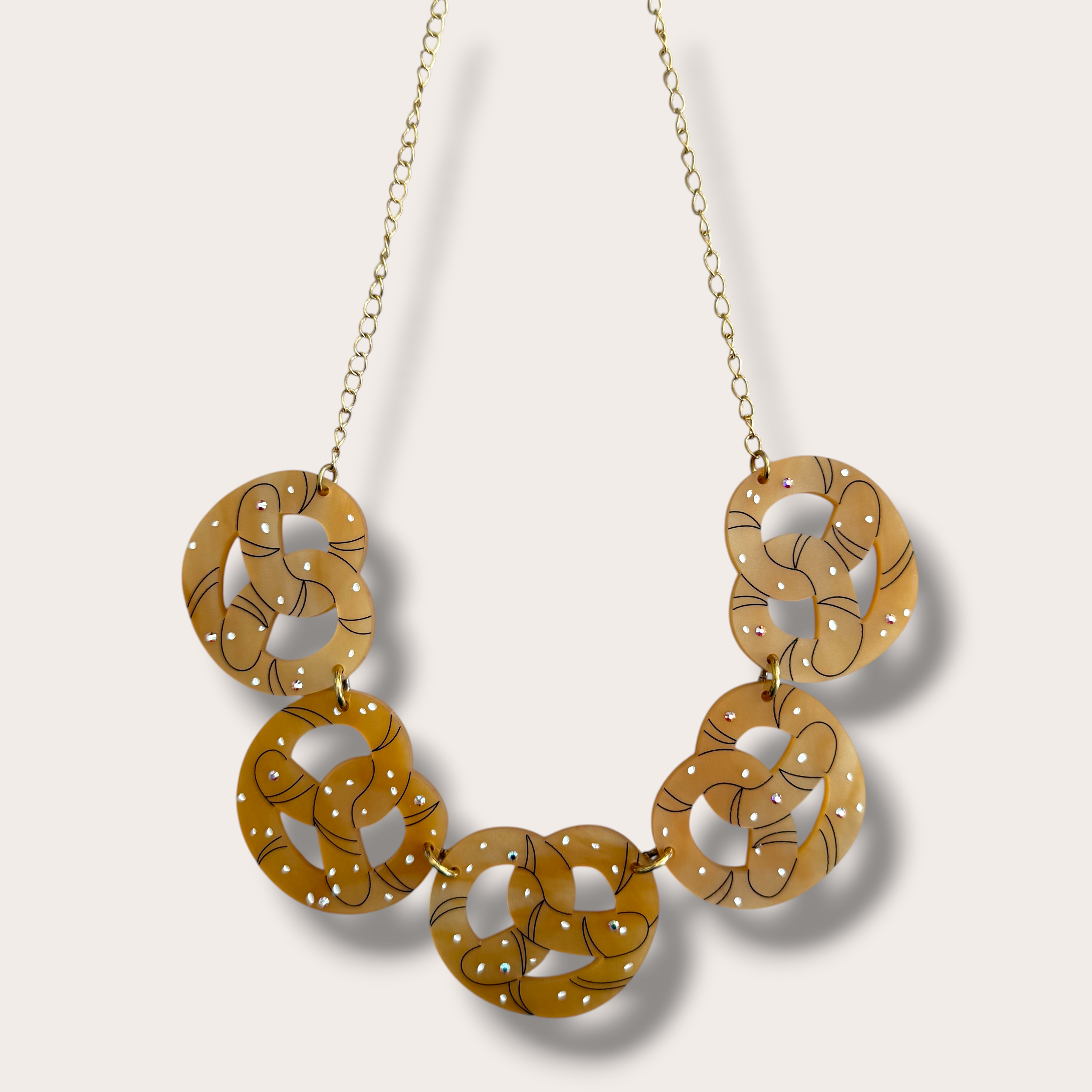 Danilova, La Vidriola, Pretzel, Acrylic Necklace2.PNG