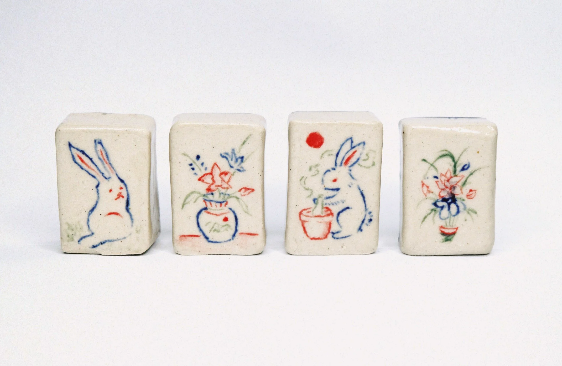 The mahjong tiles I designed reflect the identity that has been shaped by these gatherings and the people who surrounded me. Each symbol carries a personal meaning: rabbits represent my birth year, the Year of the Rabbit; the gourd references the cha