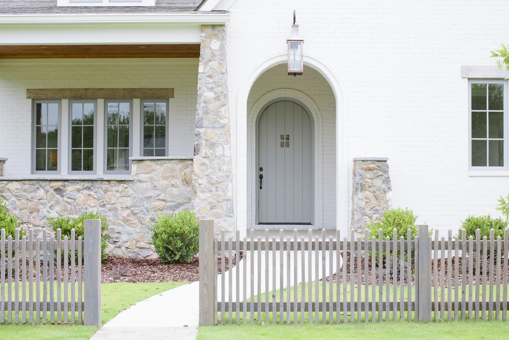 Light Blue Curved Wood Front Door by Sierra Pacific at an Alabama Home