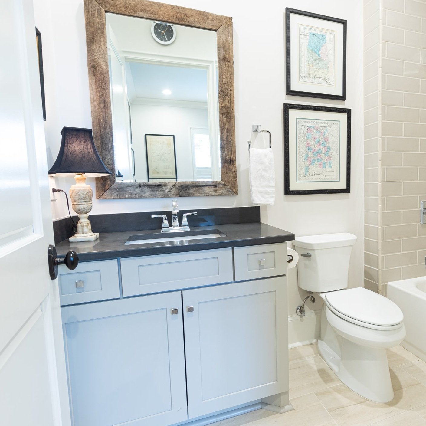 Tuscaloosa-Indian-Hills-Hall-Bathroom-Light-Blue-Black-Stone-Subway-Tile