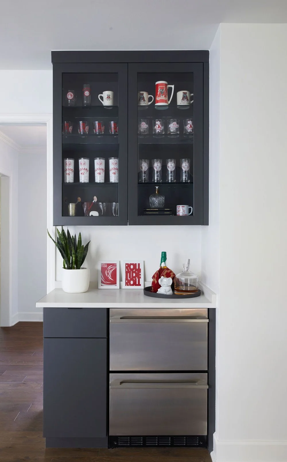 Slab Cabinetry Meets Functional Design in a Game Day Bar