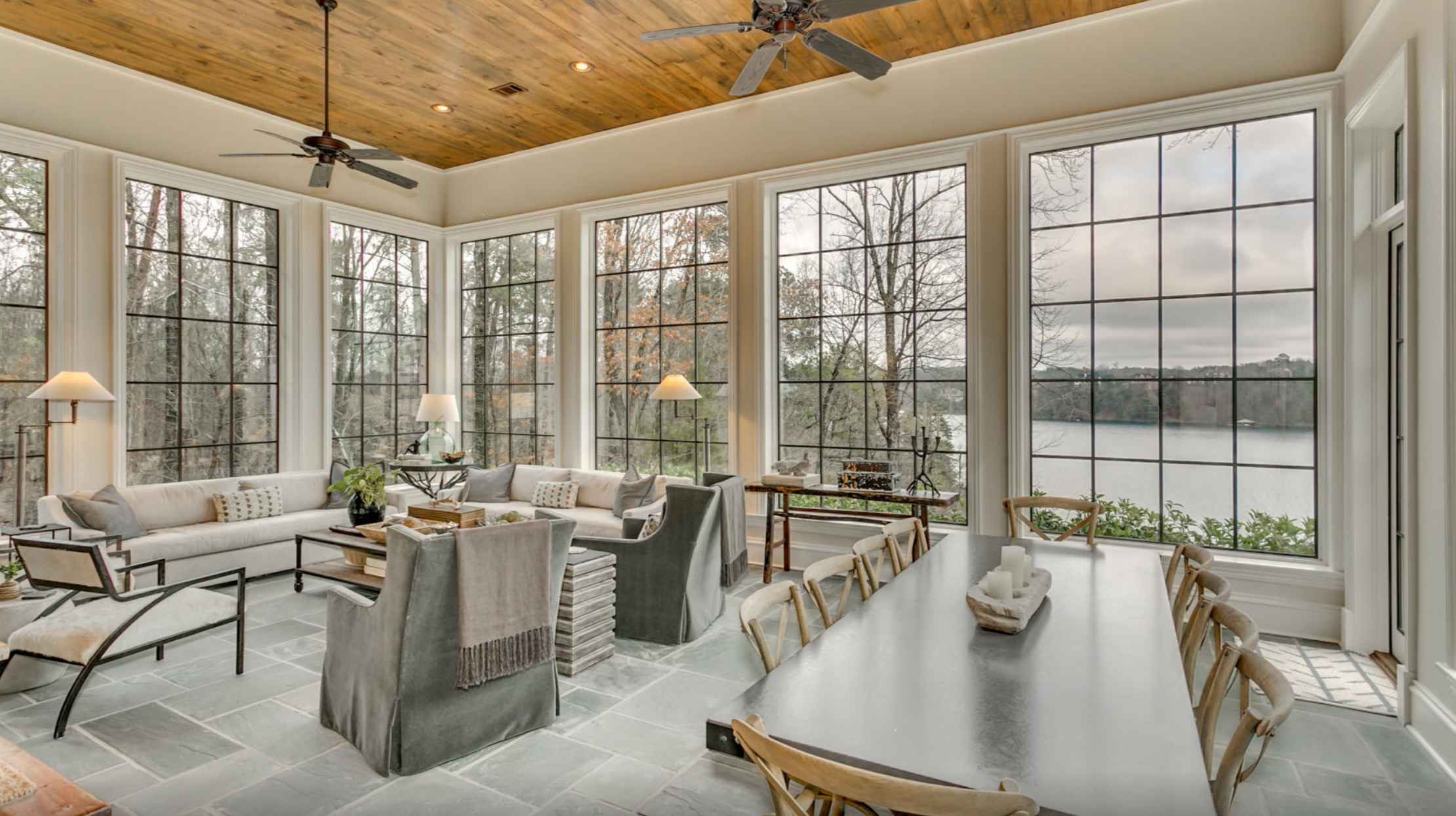 Lake Tuscaloosa home with expansive Sierra Pacific windows, showcasing floor-to-ceiling glass walls that frame panoramic water views and bring in natural light