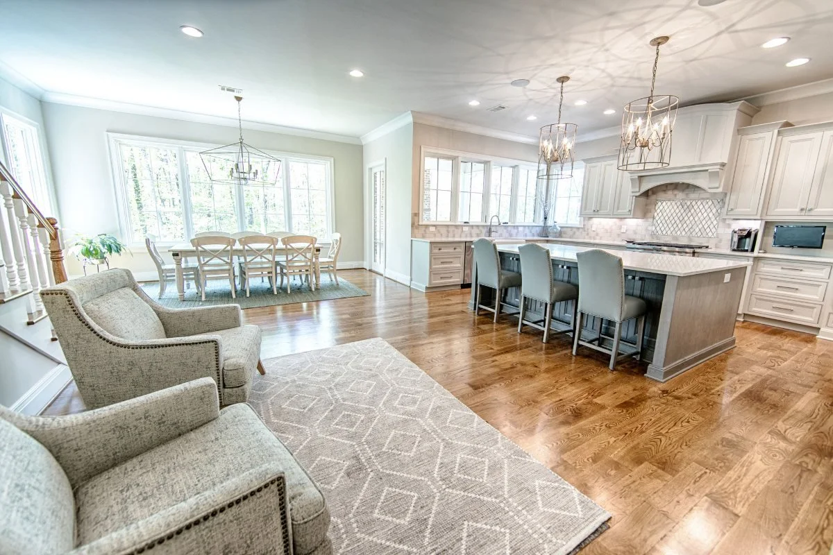 Open-concept kitchen and dining area with a large island in a Tuscaloosa, Alabama home.