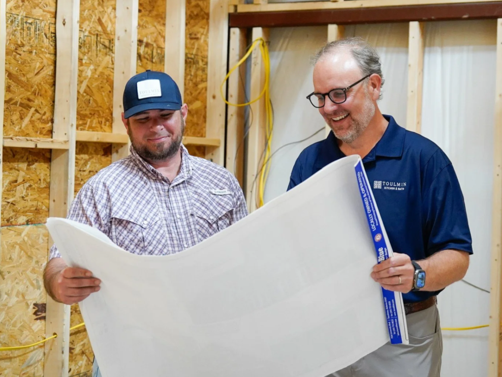 Toulmin Kitchen & Bath Design - Build Team Reviewing Remodel Plans On-Site