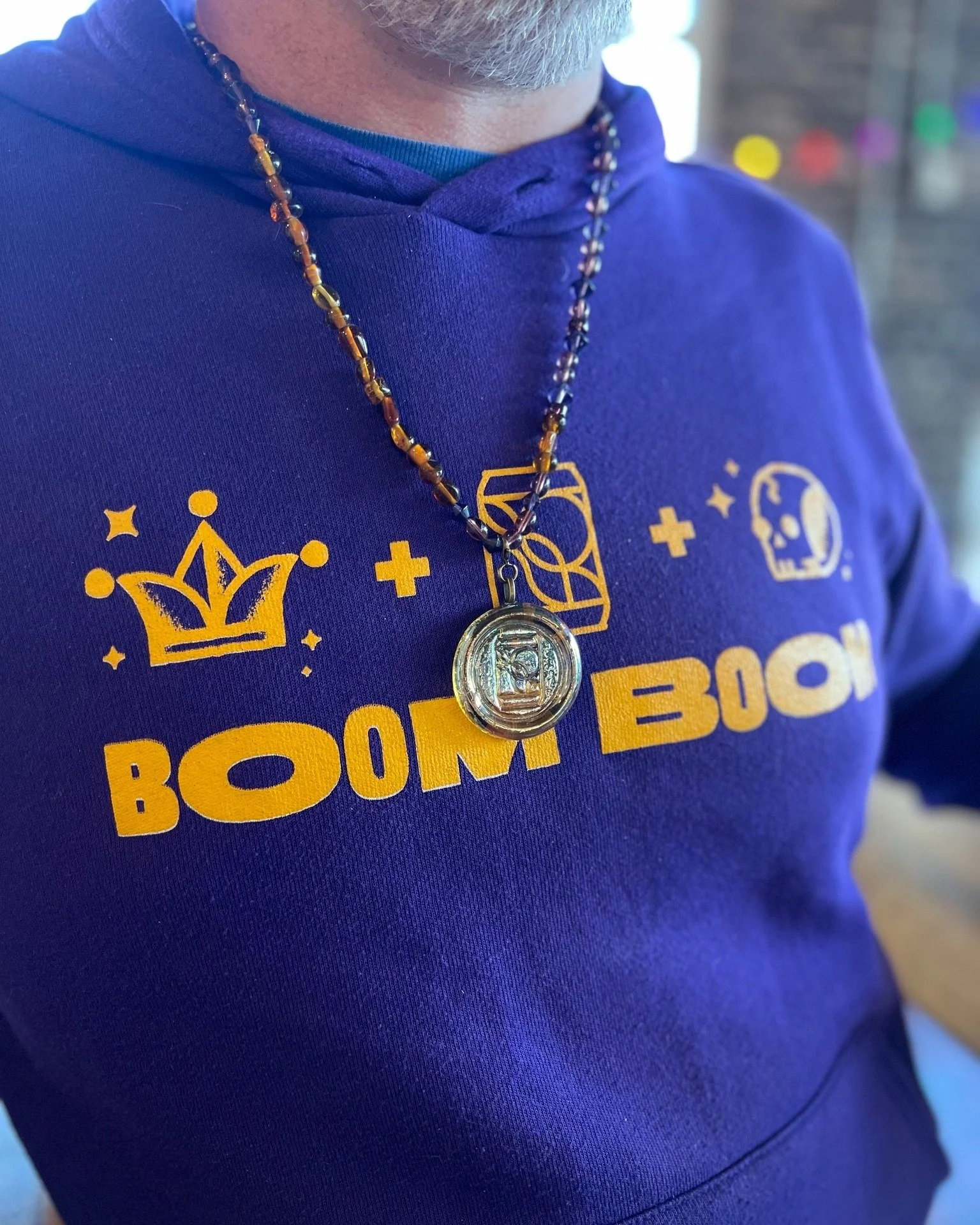 Twelfth Night is only 25 days away! 💜💛 We'll have lots of new Mardi Gras merch available at our Carnival kickoff party, including these one-of-a-kind glass bead necklaces, featuring BRBC medallions from our friends at @muffinjawdesigns!