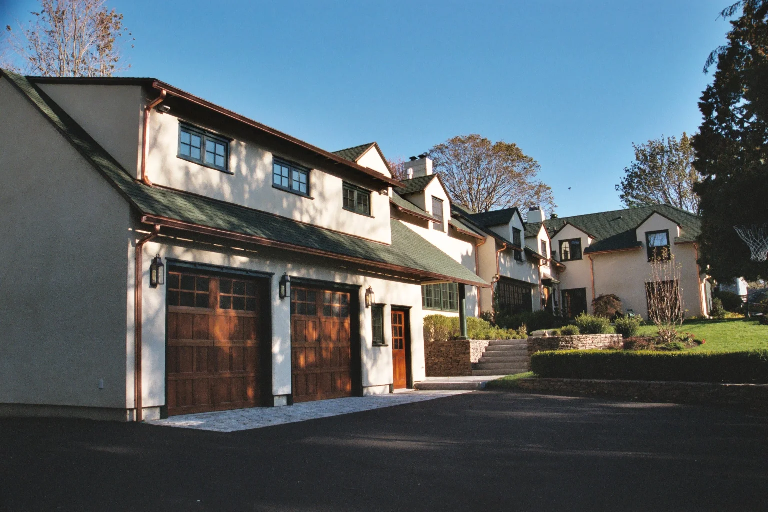 An expansion to a "Cottage Style" home adds multiple functions