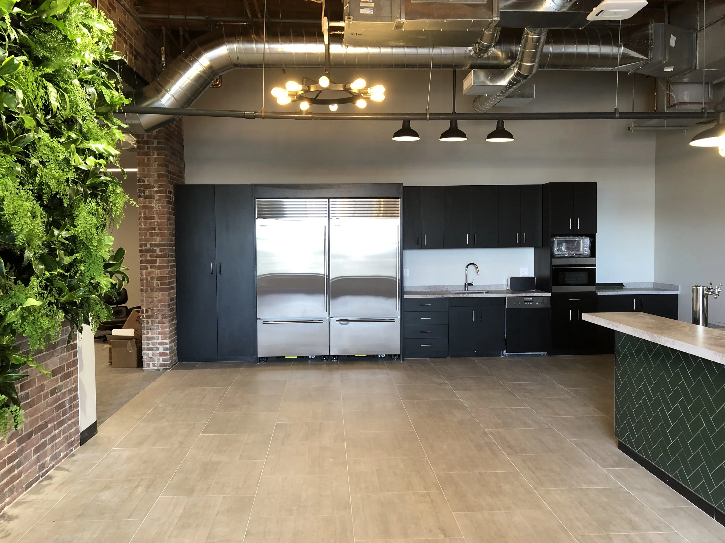 The entry to the office serves as a cafe space