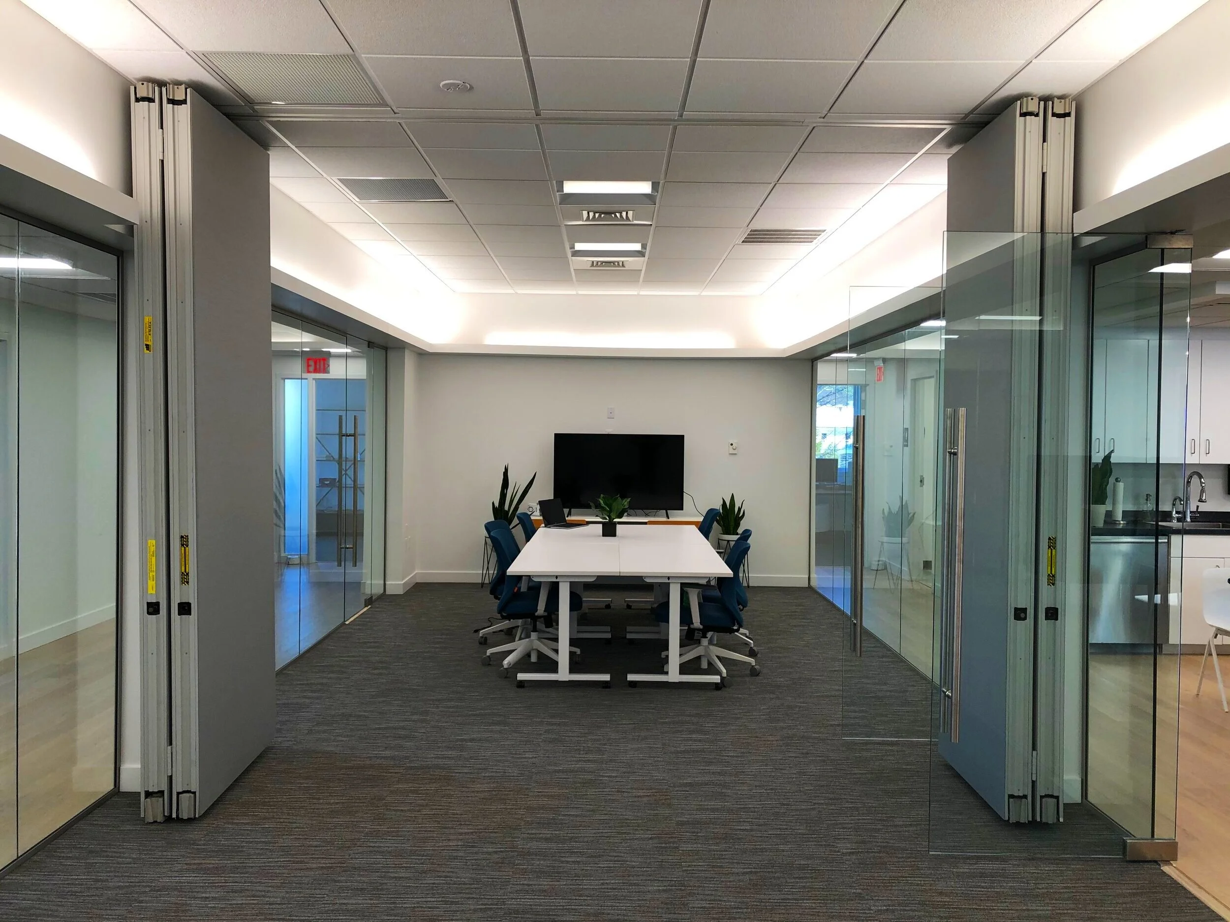  The central conference room has the ability to be split into two spaces with an operable sound isolating partition. 