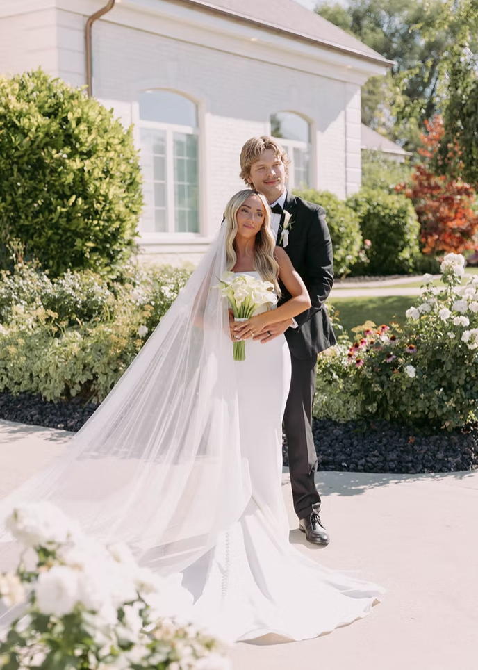 Wedding reception at Events at Magnolia in Draper, Utah with rustic barn venue and warm lighting. Millcreek  Utah Wedding Invitations