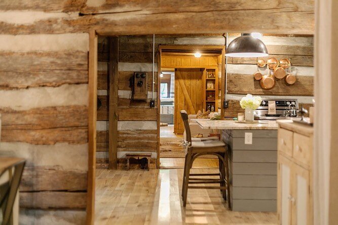 Nestled in the woods on two secluded and serene acres, Logcastle (circa 1855) is an authentic log cabin that has been brought to life and filled with the perfect blend of local antiques, modern furnishings and plenty of rustic spirit. Moved from its 