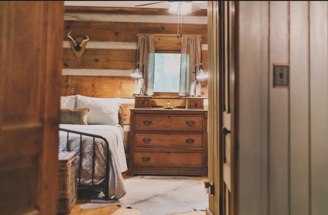 Take advantage of our discounted winter dates at dreamy Logcastle! Nestled in the woods on two secluded and serene acres, Logcastle (circa 1855) is an authentic log cabin that has been brought to life and filled with the perfect blend of local antiqu