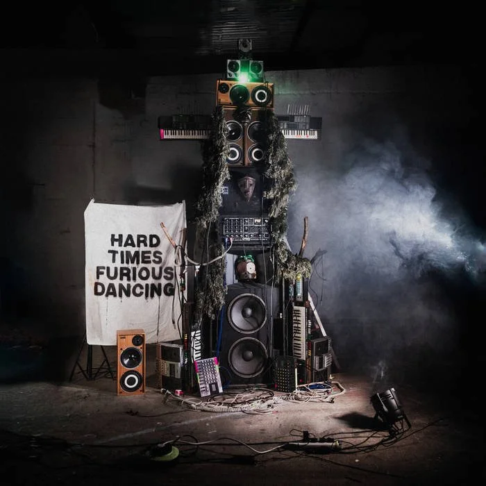 Portada del disco Hard Times Furious Dancing de Snapped Ankles.