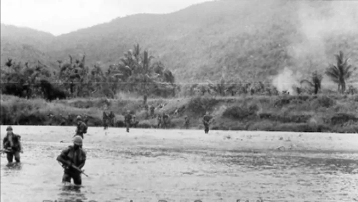 Alpha Company soldiers crossing river crossing near Bong Son, photo by Robert Matulac.