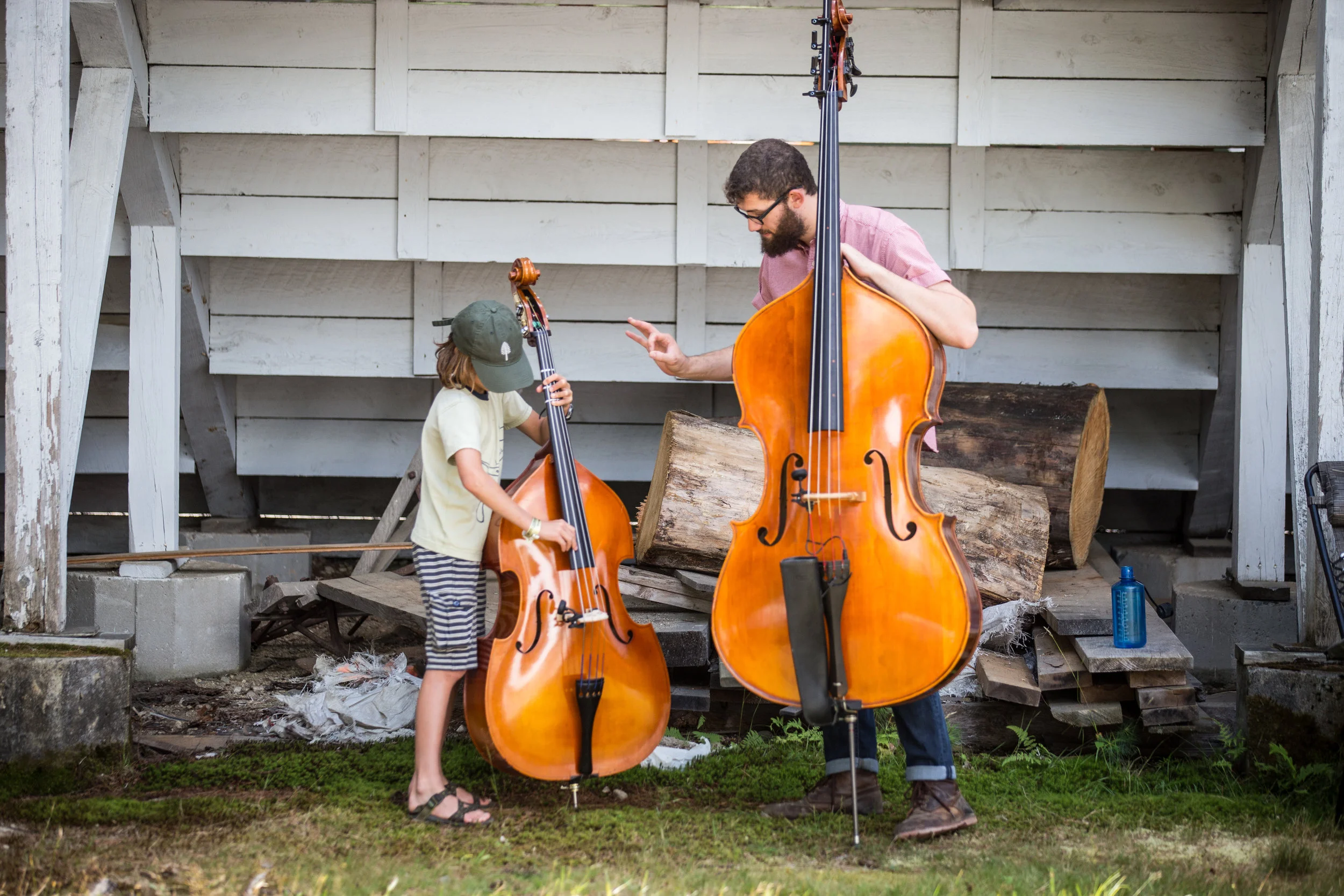 A new bass student gets his first lesson at the music festival! 