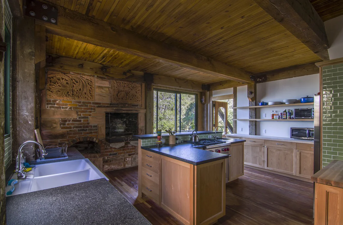Kitchen with the wood burning fireplace.