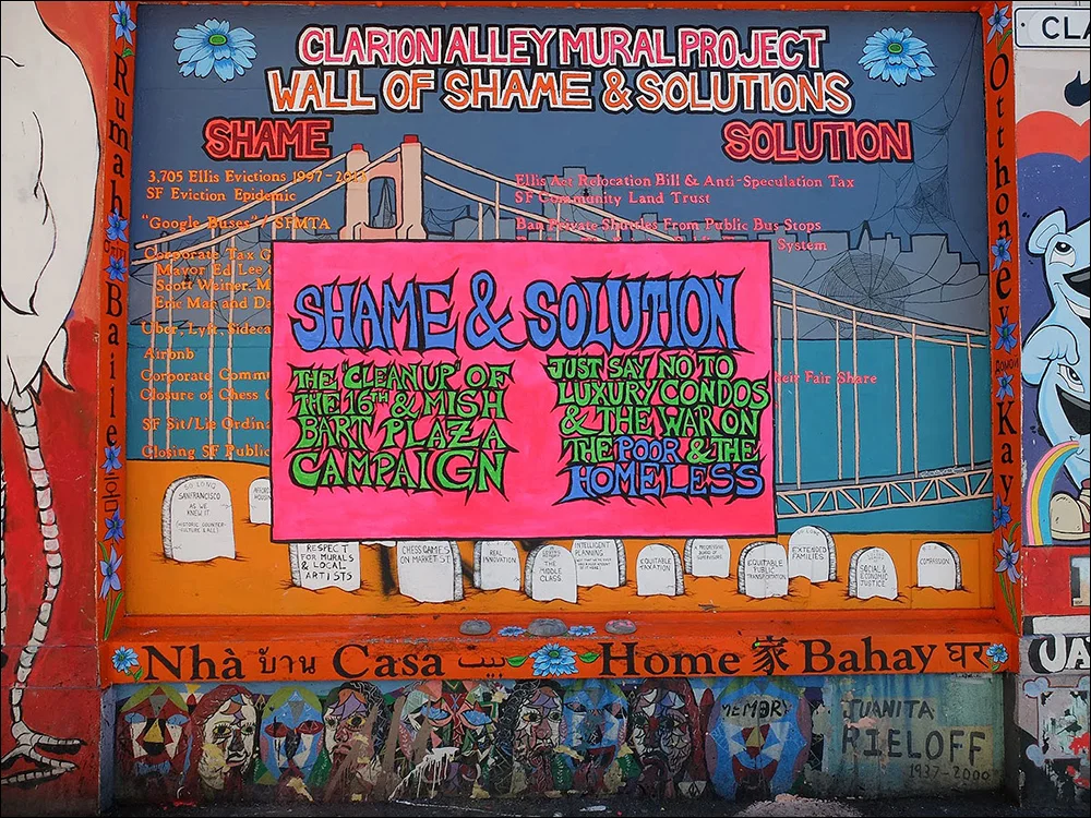 The mural was tagged several months after it was painted. The bright pink block was the response.