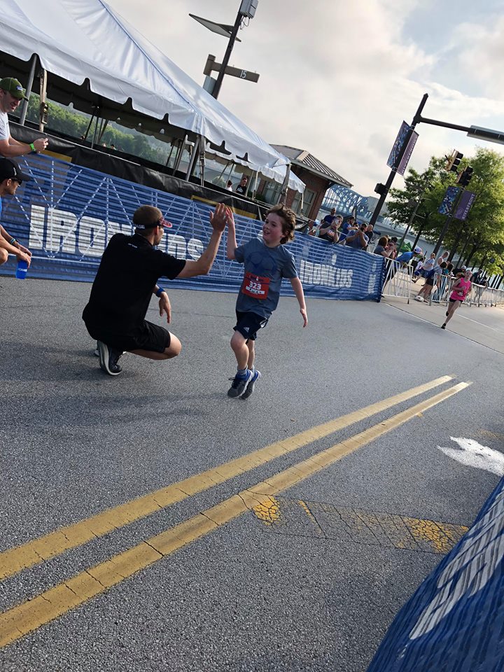 Coach_Terry_Wilson_Andrew_Starykowicz_Ironman_Chattanooga_70.3_High_Fives2.jpg