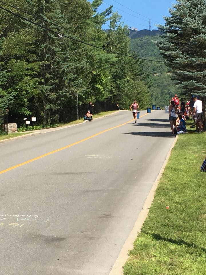 Coach_Terry_Wilson_Pursuit_of_The_Perfect_Race_IRONMAN_Mont_Tremblant_Richie_Szeliga_Smiling_Run_1.jpg