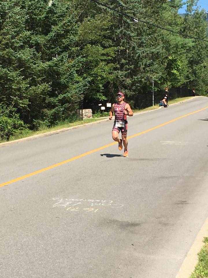 Coach_Terry_Wilson_Pursuit_of_The_Perfect_Race_IRONMAN_Mont_Tremblant_Richie_Szeliga_Smiling_Run_2.jpg