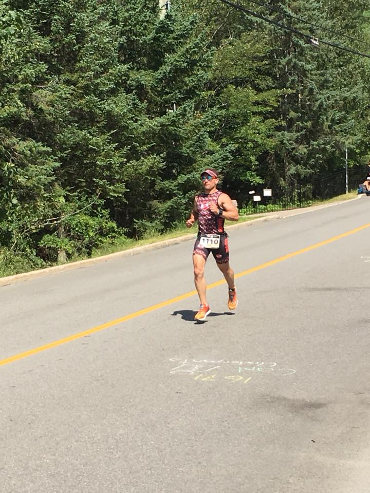 Coach_Terry_Wilson_Pursuit_of_The_Perfect_Race_IRONMAN_Mont_Tremblant_Richie_Szeliga_Smiling_Run_3.jpg
