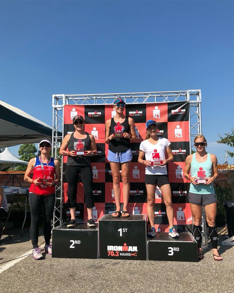 Coach_Terry_Wilson_Pursuit_of_The_Perfect_Race_IRONMAN_Maine_70.3_Missy_Norcross_Finish_Line_Podium.jpg