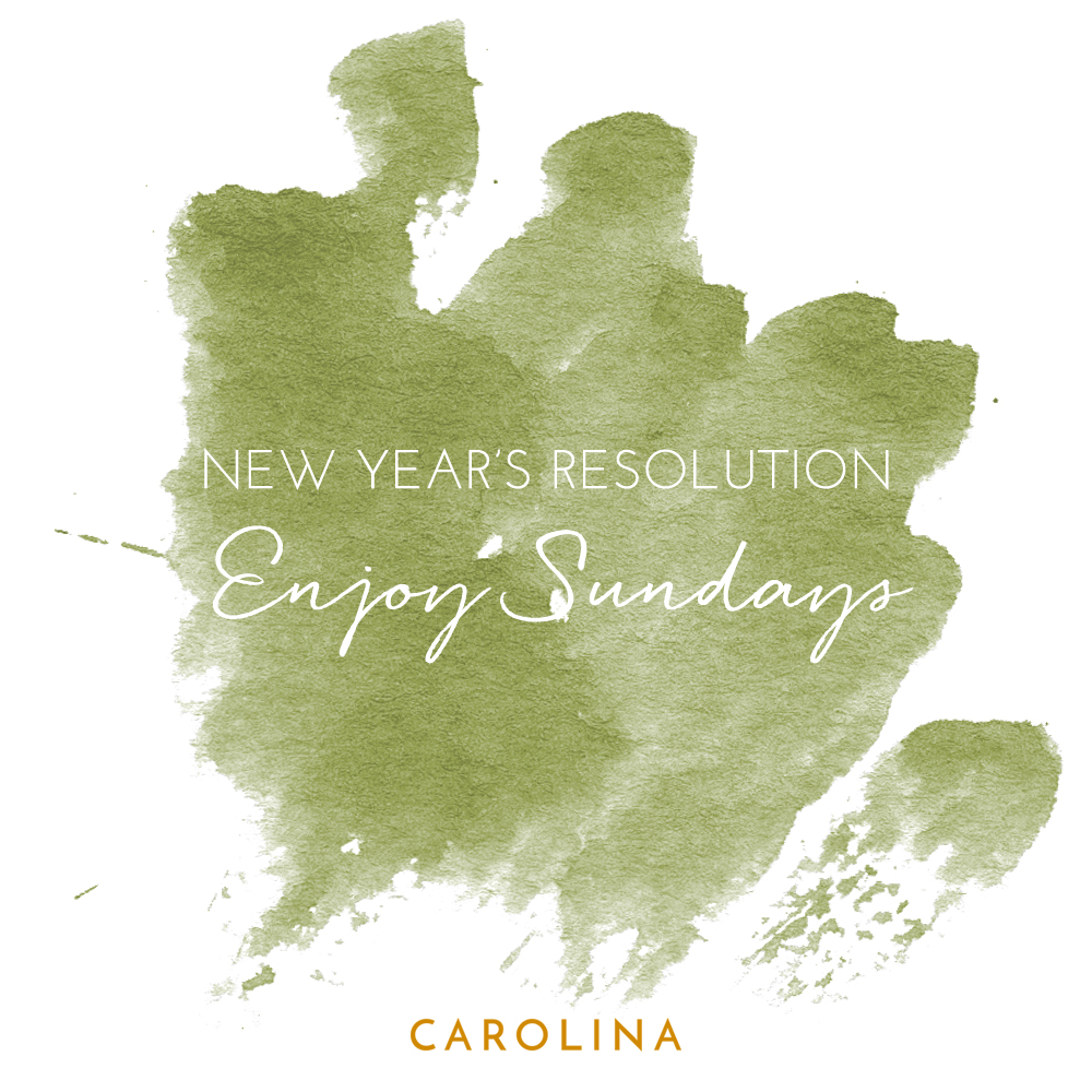 A Carolina Boutique New Year’s resolution Instagram post with a green watercolor background.