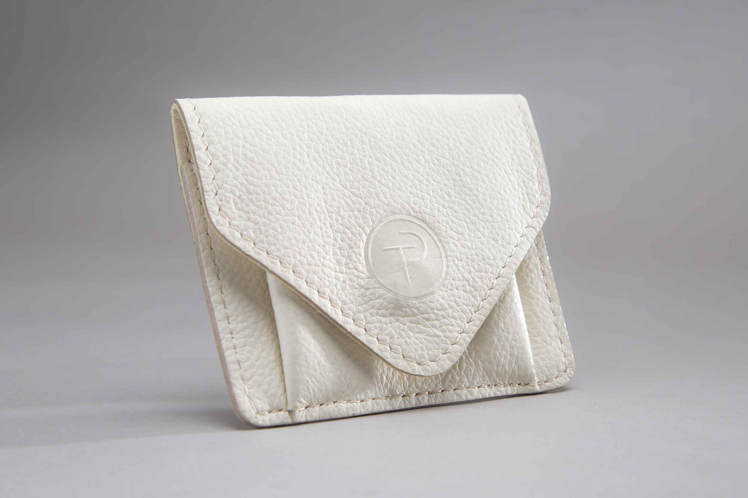 A leather pouch that holds the Thomas Pinck jewelry.