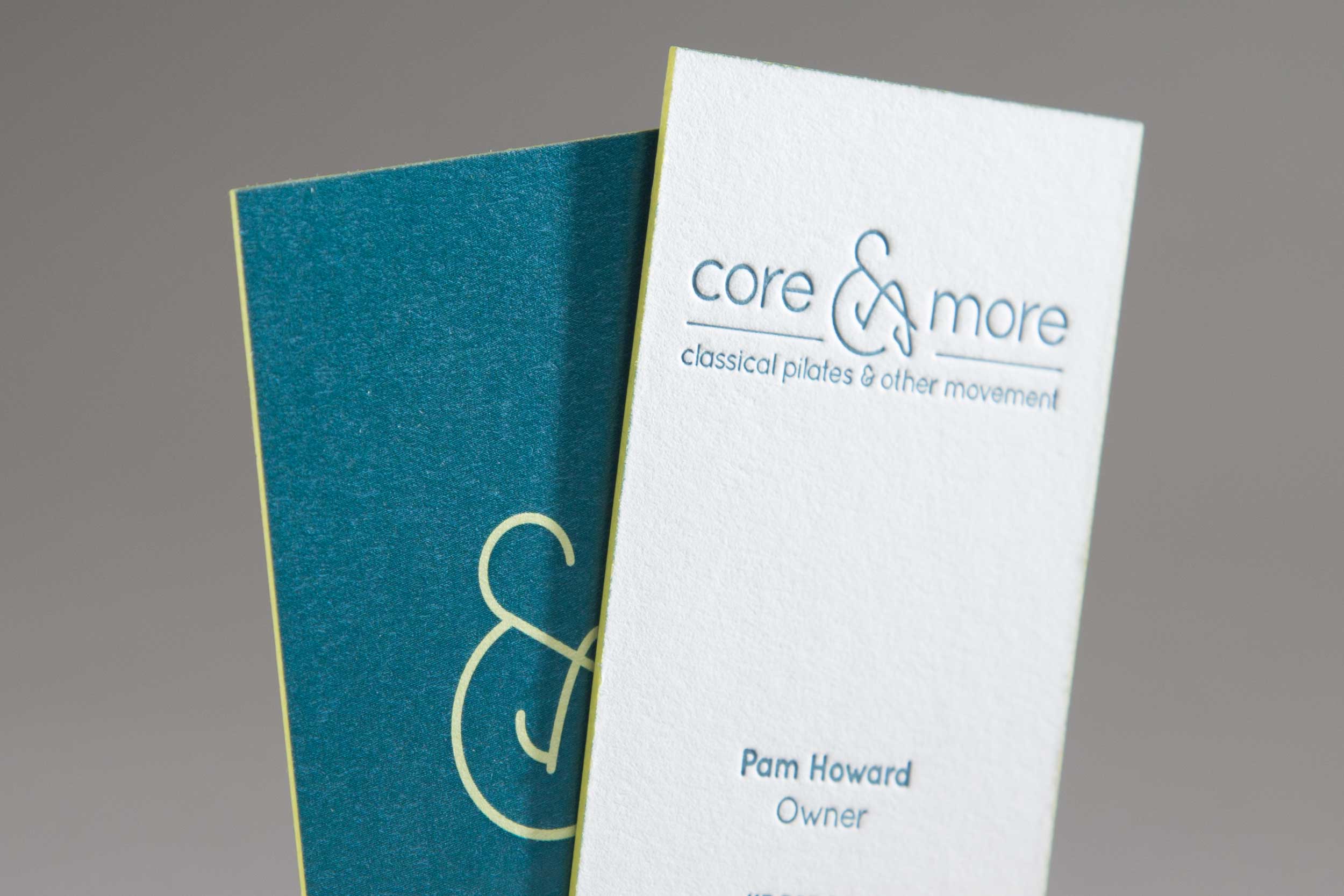 Letterpress business cards showing the Core and More identity. 