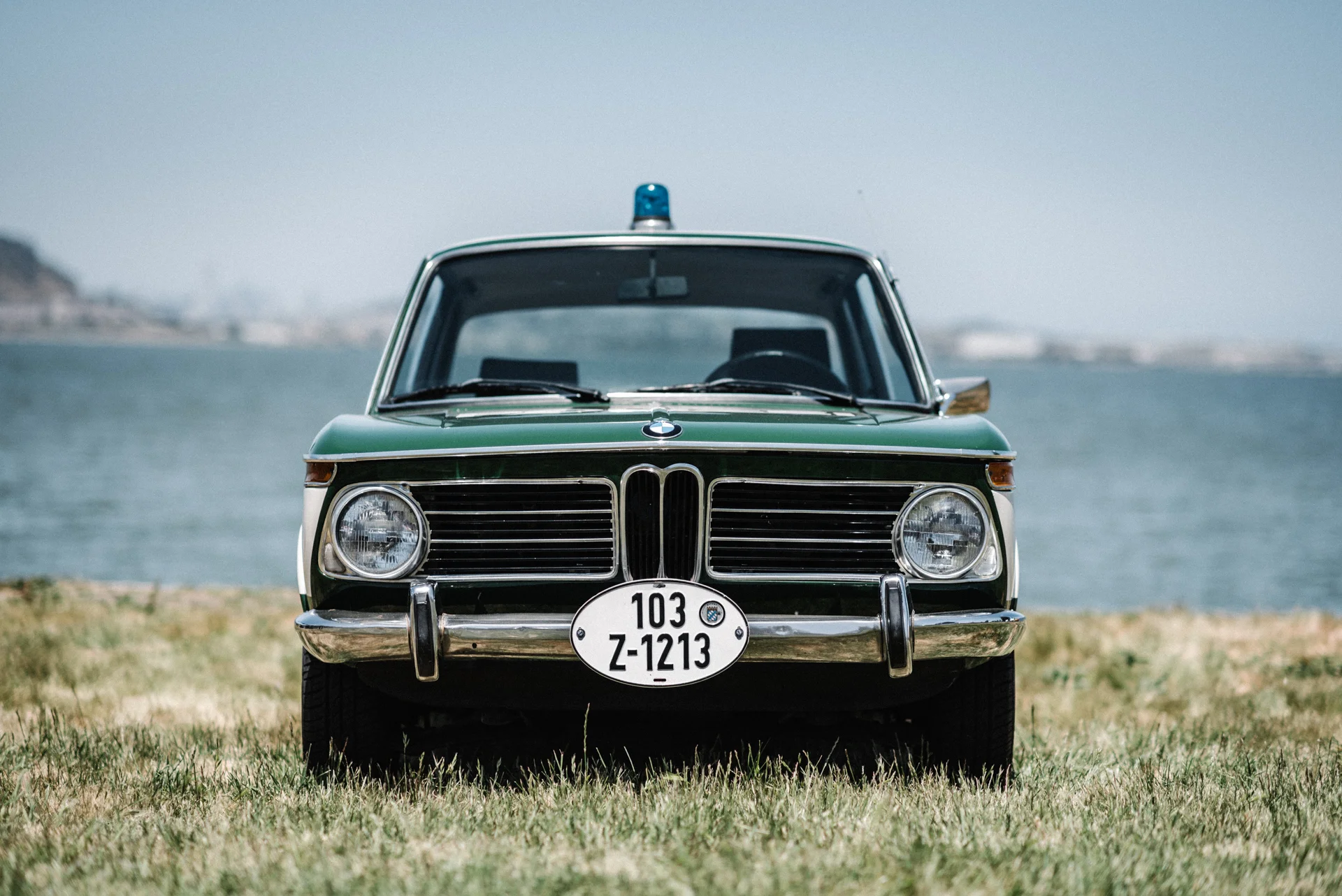 The 02 is equipped with a PA system, period siren + light, and Polizei vinyl livery.