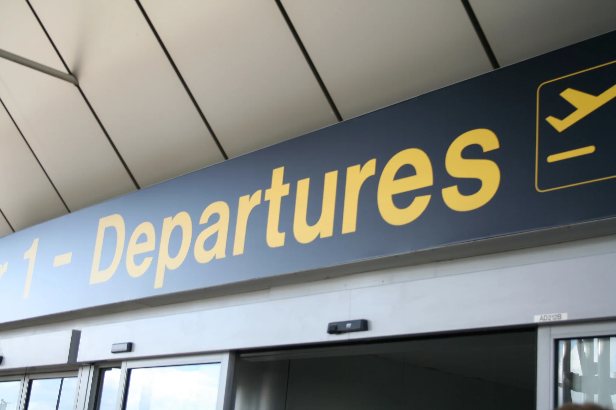 expat-repatriation-blues-departure-sign.jpg