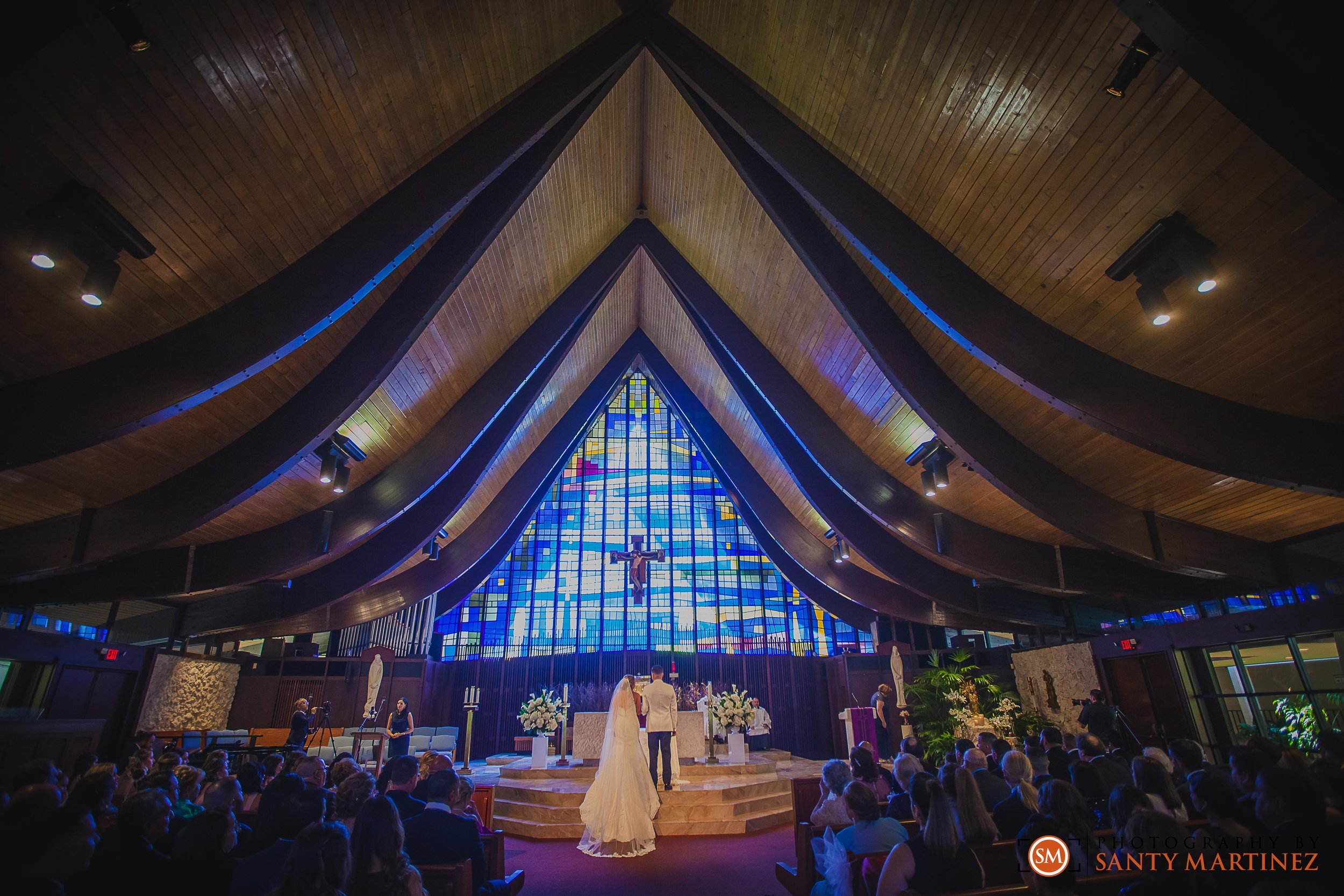Wedding - St Hugh Catholic Church - Rusty Pelican - Key Biscayne - Photography by Santy Martinez-21.jpg